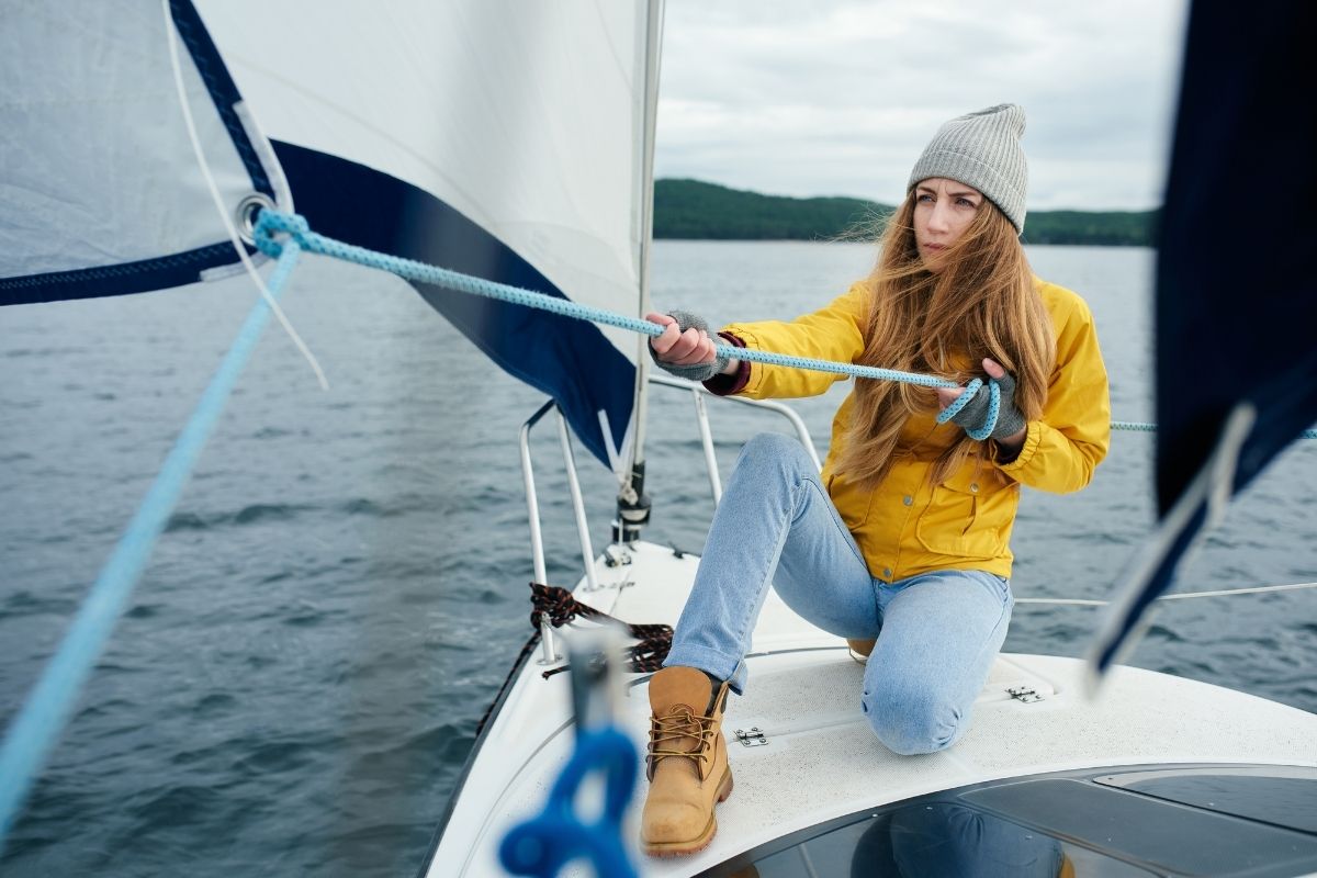 Young beautiful women first time sailing