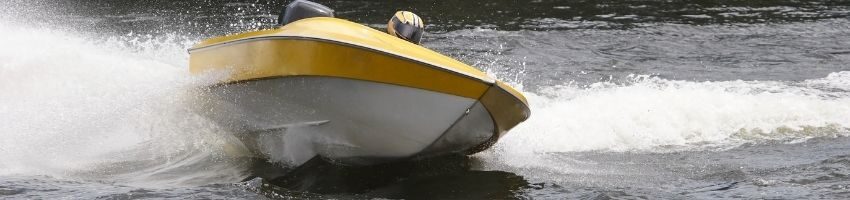 small boat drifting towards east in the ocean