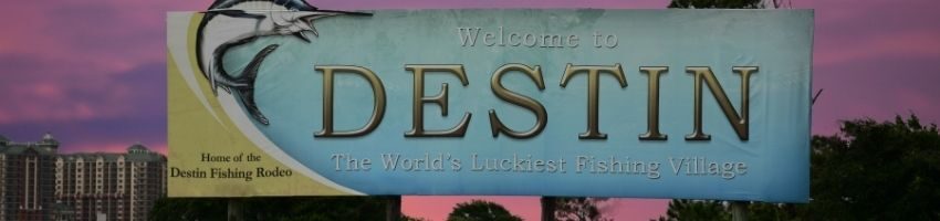 A signage leading to Crab Island Destin Florida.