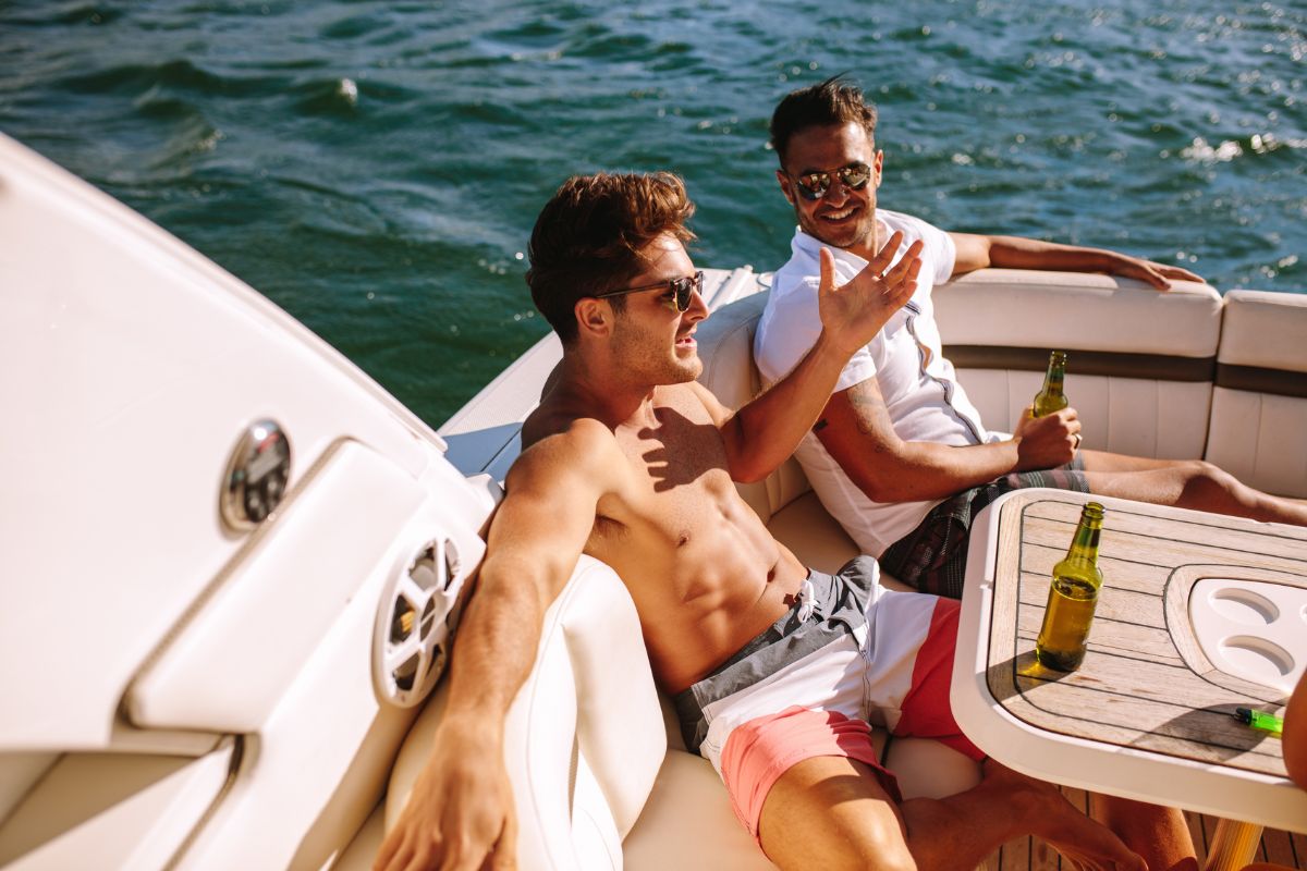 Two men chilling in a yacht.