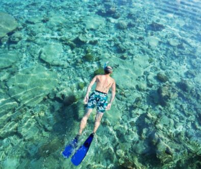 A man snorkeling in the Carribean.