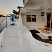 Seafari Boca Raton yacht outdoor lounge area and side walkway.
