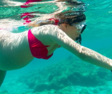 A pregnant woman went snorkeling.