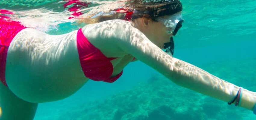 A pregnant woman went snorkeling.