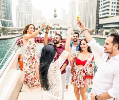 A group of friends are enjoying a yacht party.
