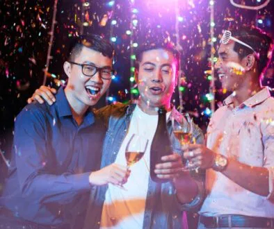 A group of men is having fun at a bachelor's party.