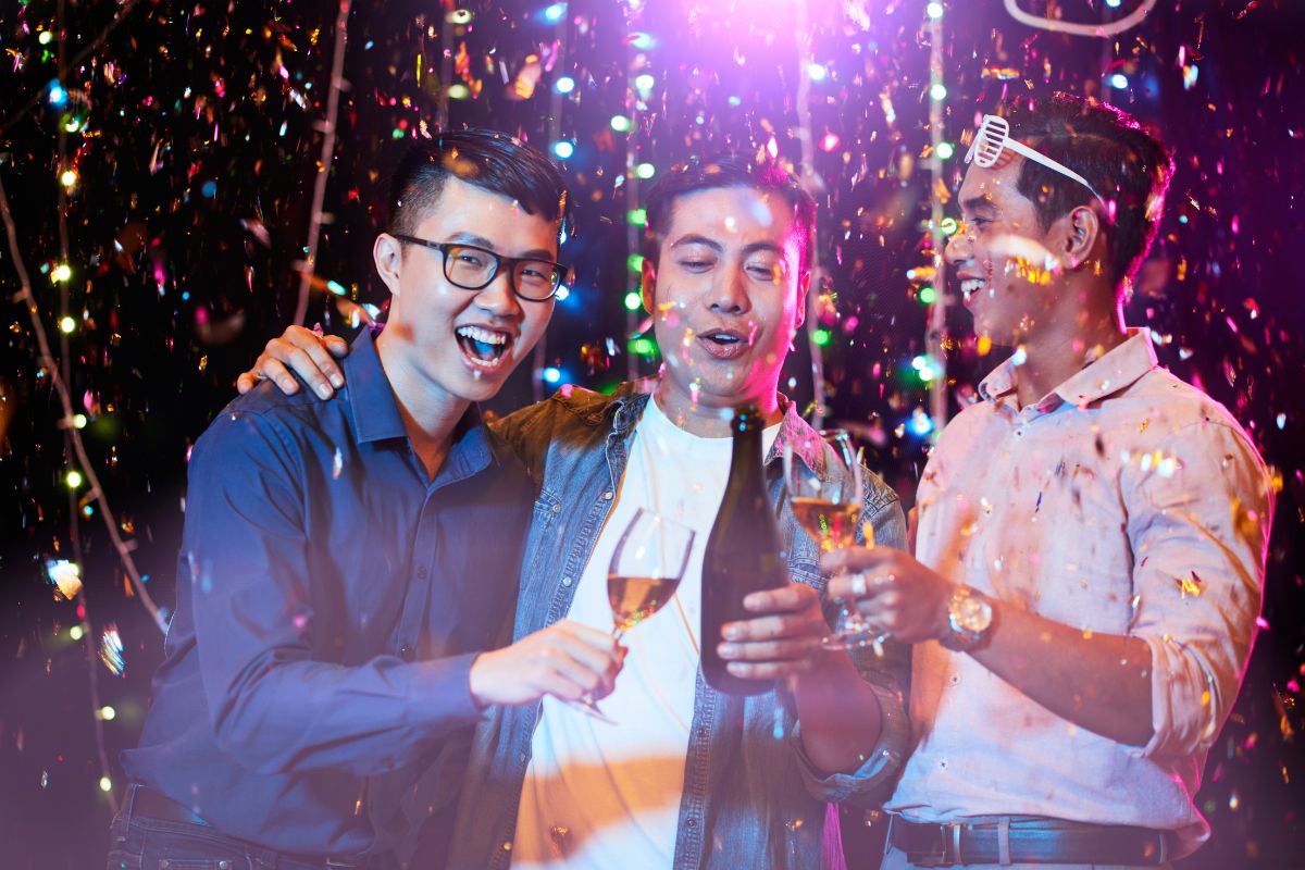 A group of men is having fun at a bachelor's party.