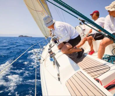 Men always wear hats when sailing.