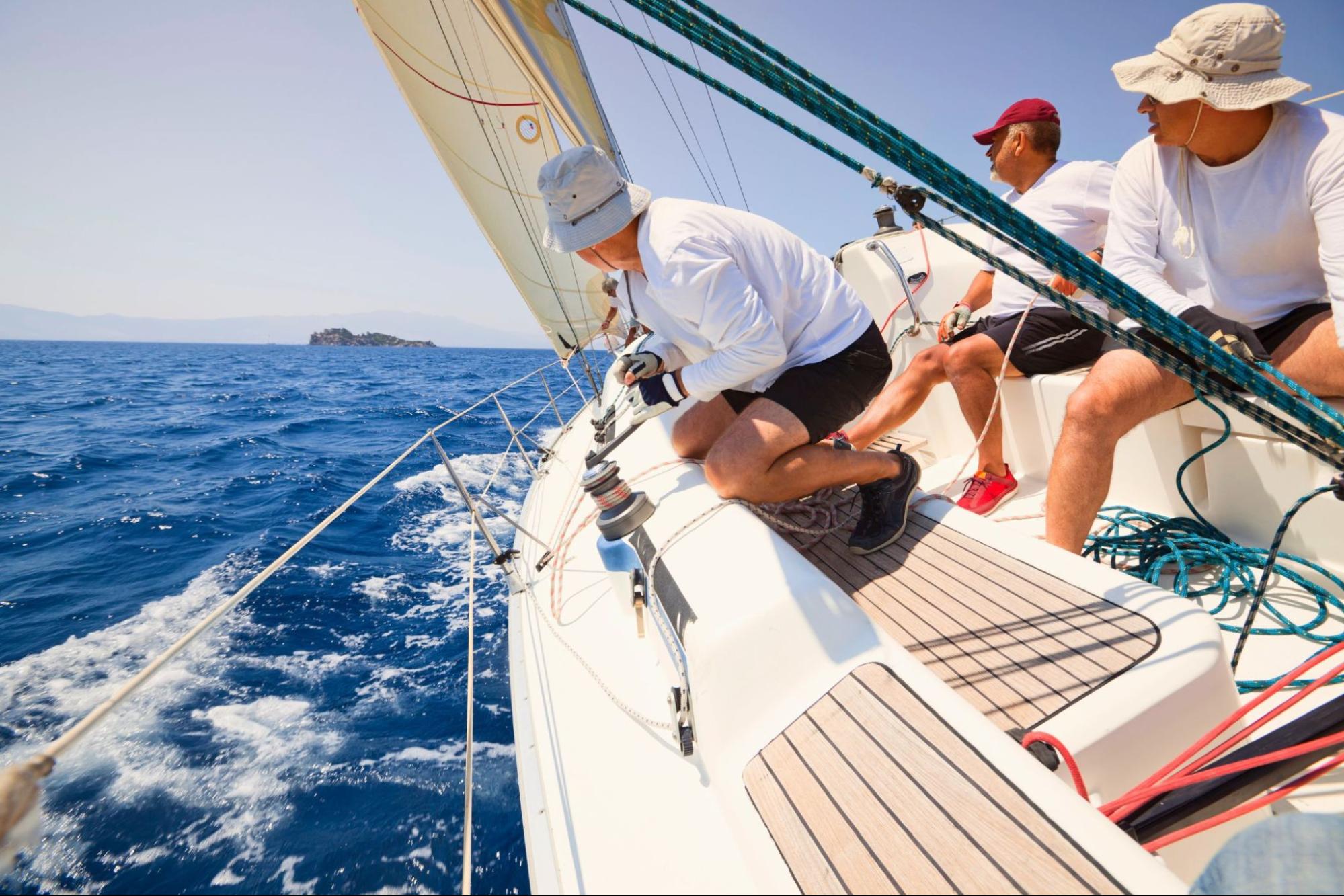 Men always wear hats when sailing.