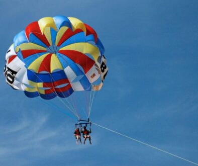 A couple do parasailing in Pensacola.