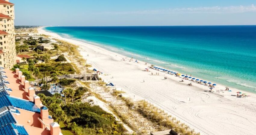 Discover the allure of Destin Beach and its breathtaking emerald-green waters.