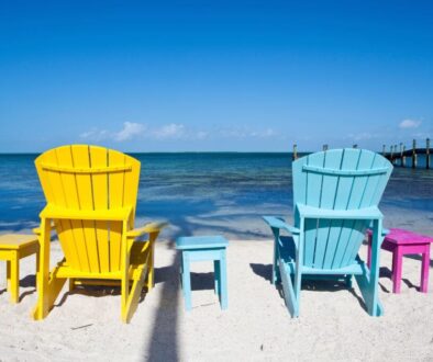 The set of wooden chairs in front of Key Largo Beach.