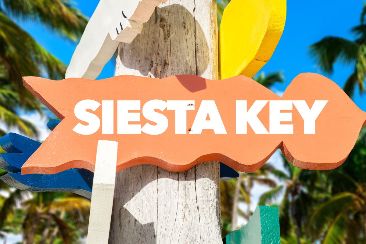 Siesta Key is an idyllic barrier island near Sarasota, Florida. It's known for its powdery white sands, clear turquoise waters, and mesmerizing sunsets that adorn the sky.